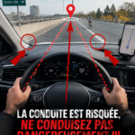 Une femme au volant d'une voiture en conduisant avec attention