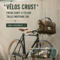 Un vélo Crust au design élégant et moderne sur une route ensoleillée.